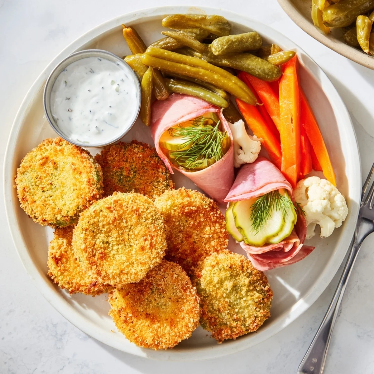 A colorful platter of pickled vegetables and fried pickles brings joy in the Pickle Lovers Meal.  