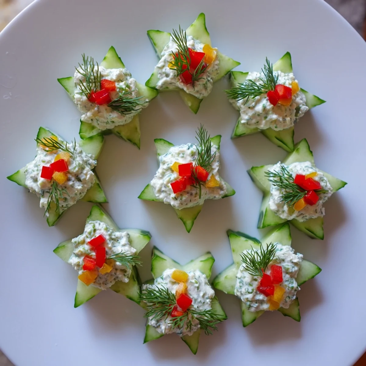 Freshly made cucumber and dill Christmas stars, beautifully arranged and ready to be served.