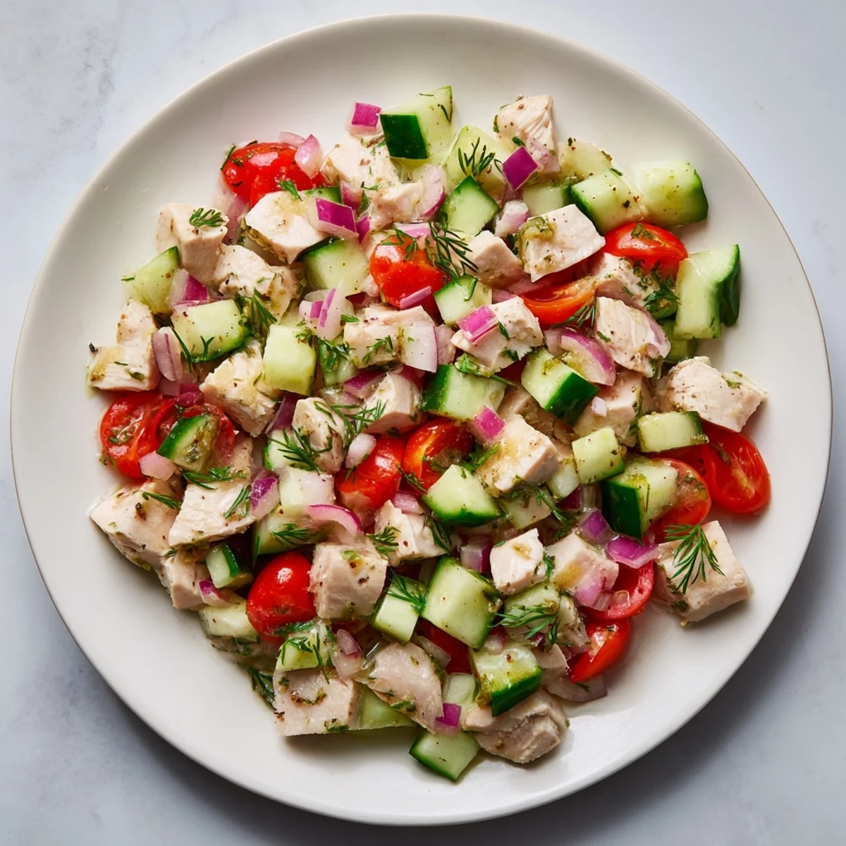 Chilled Cucumber and Chicken Clean Shaker tossed in a light dressing, a delicious summer salad.