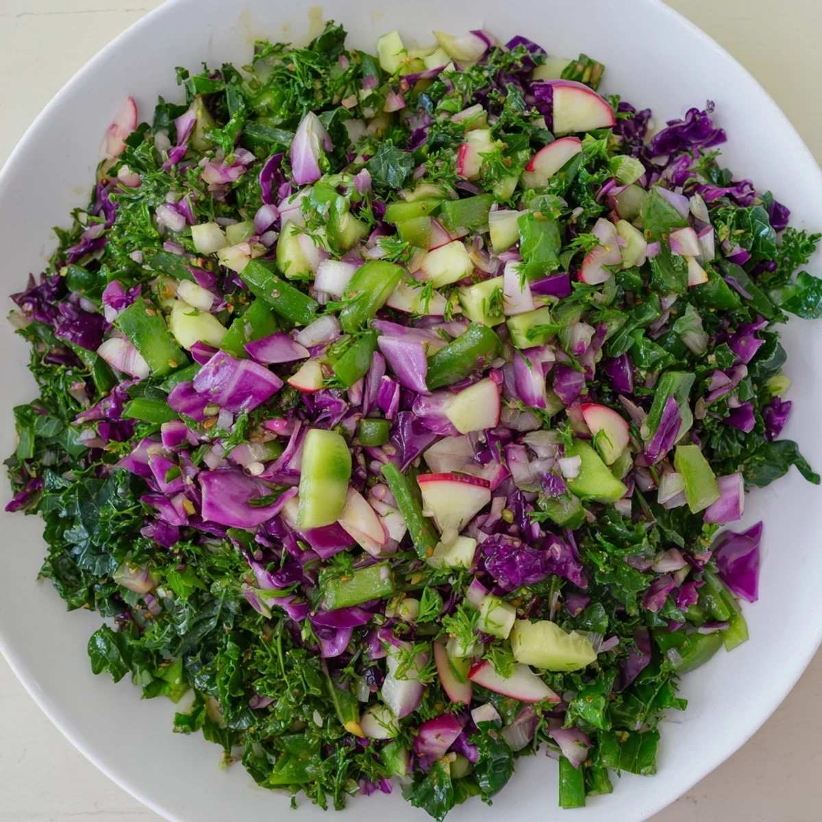 This vibrant Green Goddess Detox Cabbage Salad features shredded cabbage and a creamy avocado dressing.