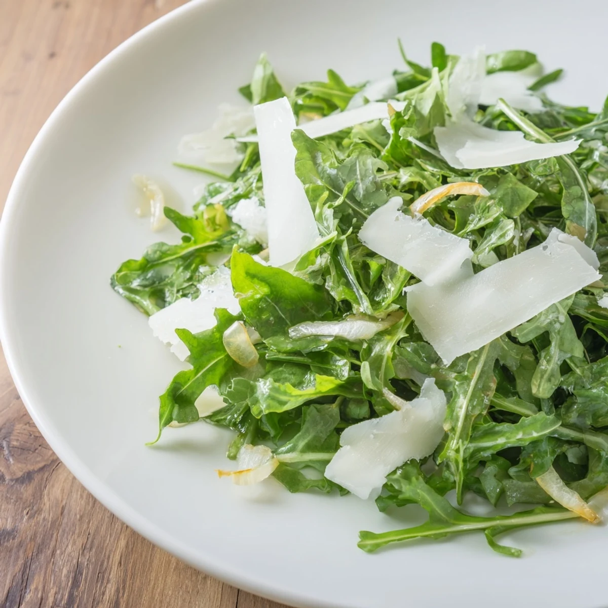 A simple and elegant arugula salad with zesty lemon flavors, ready in just 10 minutes.