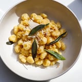 Close-up of savory Brown Butter & Sage Ditalini, garnished with extra Parmesan and crispy sage.