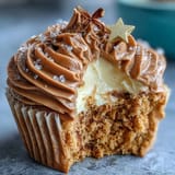 Soft, vanilla Taurus birthday cupcakes crowned with velvety, warm brown-toned buttercream swirl.
