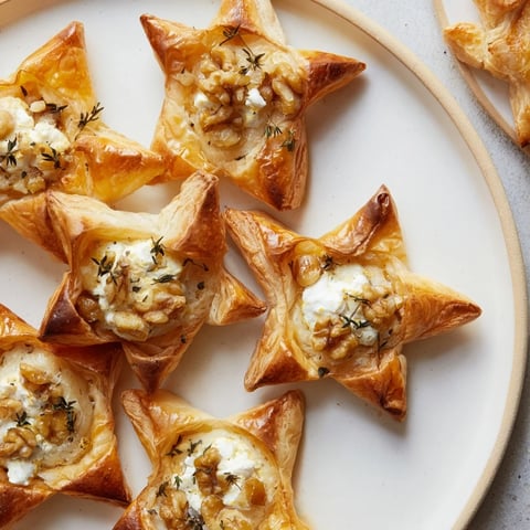 Golden baked Starry Night New Years Appetizers, showcasing flaky pastry and vibrant toppings, perfect for a party.