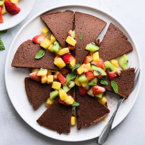 Delicious chocolate tortilla chips paired with fresh fruit salsa for dipping.  