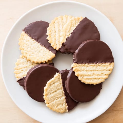 Delicious homemade Simple Cookies: Vanilla Wafers, beautifully arranged, ready to enjoy with a cup of coffee.