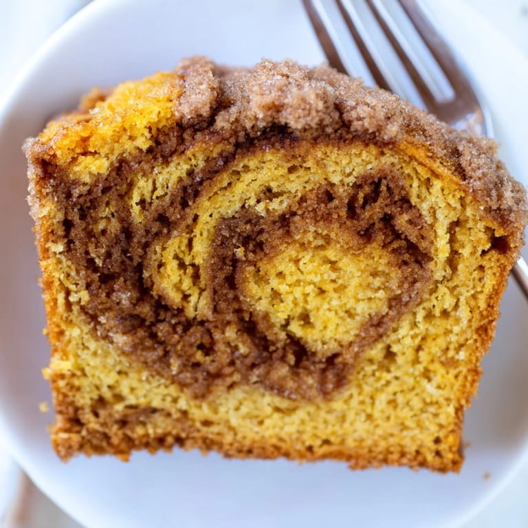 Sliced Churro Pumpkin Snickerdoodle Bread showcases warm spices and sweet cinnamon swirls.  