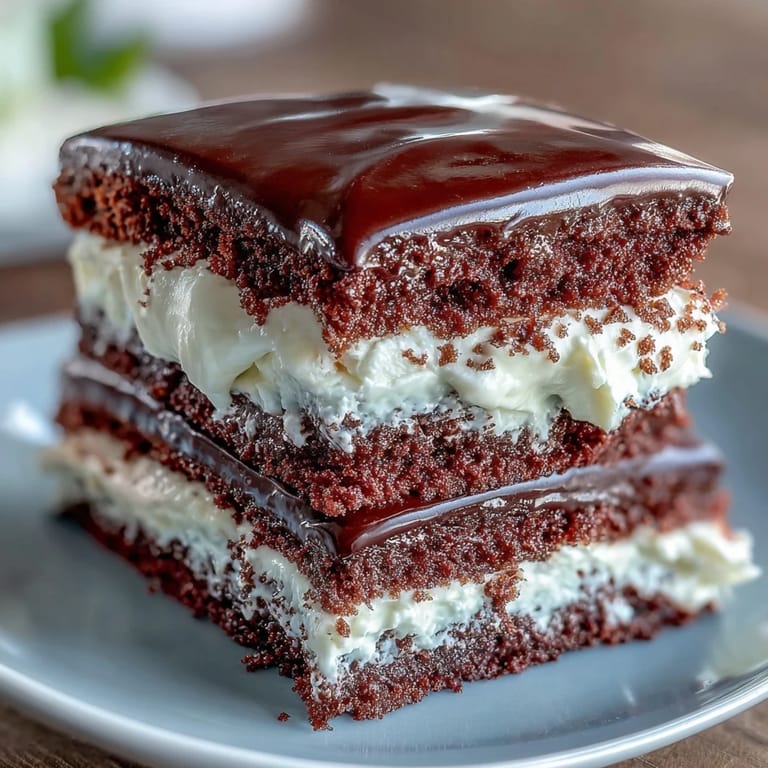 Classic vanilla sheet cake decorated with buttercream and piped Class of 2026 design, perfect for graduation festivities.